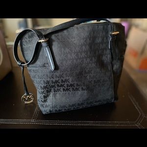 Black Michael Kors tote.